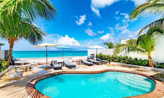 Nassau House | Caprice 14: Oceanfront Villa with Pool in Gated Community