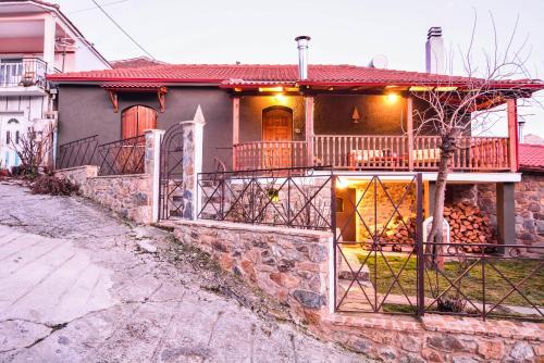 Archaia Feneos Ski Chalet | Experience Capris Rustic House with Scenic Mountain Views