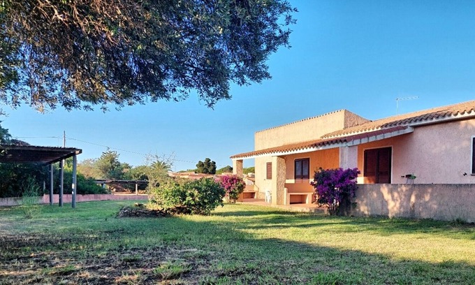 Matta 'e Peru Apartment | Carasau House: Steps from the Sea with Family-Friendly Perks