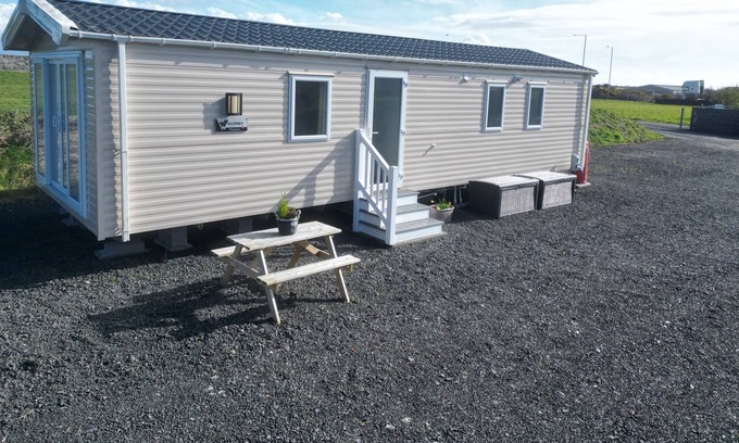 Malltraeth Cottage | Family-Friendly Caravan at Boderw with Ocean View Garden