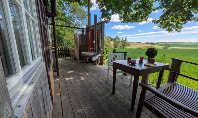 Kirch Mulsow House | Cozy Caravan for 3 Guests with Ocean View in Carinerland