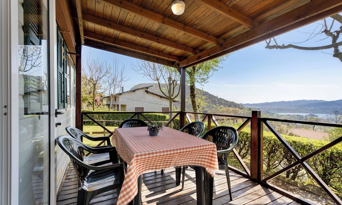 Pratolungo RV Rental | Scenic Caravan Mobile Home with Lake View and Shared Pool