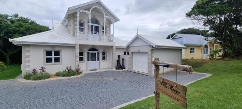 Port Edward Villa | Caribbean Estates Villa Raiya: 4-Bedroom Oceanfront Retreat
