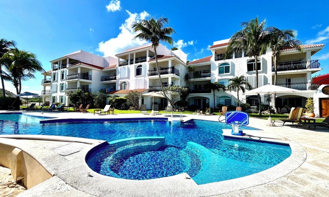 Puerto Morelos Apartment | Oceanfront Condo #232 at Caribbean Reef Villas - Family Friendly
