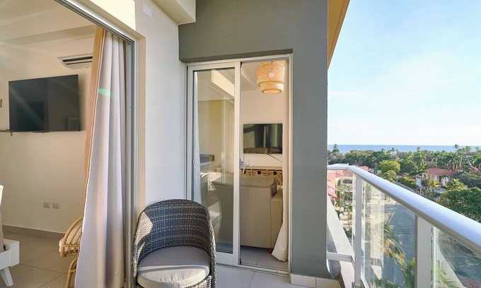 Quisqueya Apartment | Caribbean Sunset Soak Apt.In the center of town, steps from the Juan Dolio Beach