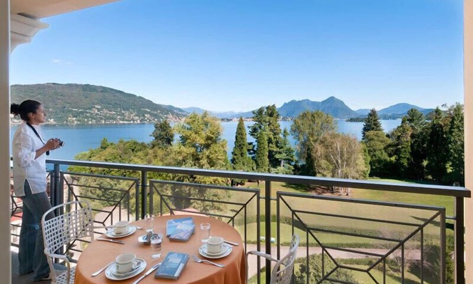 Baveno Apartment | Lake View Comfort at Carl&Do Apt with Spa & Pool Access