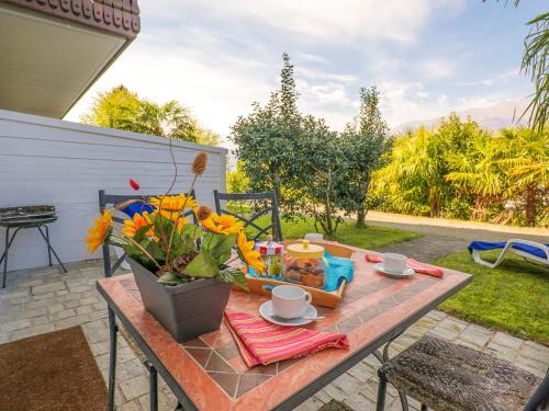 Colico Piano Apartment | Relaxing Carlo A Garten Ferienwohnung with Family-Friendly Amenities