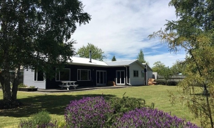 Turangi House | Trout Fishing at Carmel Cottage: Pool & Family-Friendly Fun