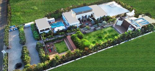Latur Resort | Relax at Carnival Resort with Pool and Breakfast Included