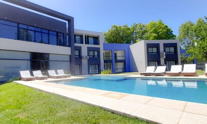 Campana Apartment | Experience Carpinchos De Otamendi: Pet-Friendly Retreat
