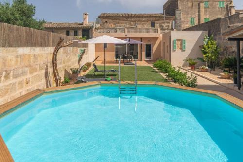 Ariany Ski Chalet | Discover Cas Padri Pep: Oceanfront Bliss for Families