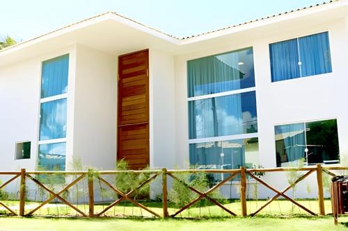 Parafuso House | Casa 6 Suítes Steps from the Beach in Guarajuba