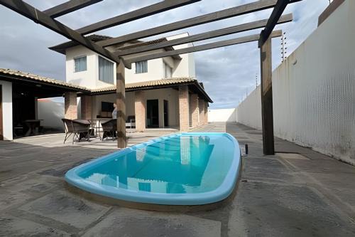 Luis Correia Apartment | Discover Casa Aconchego: Pet Friendly with Pool & High Ratings