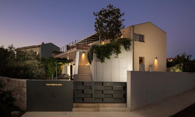 Fazana Villa | Elegant Casa Arbor Blanco: Heated Pool & Sea View Oasis
