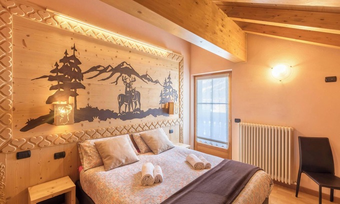 Livigno Apartment | Casa Azzurra: Mountain Views, Wi-Fi, Garden & Spa Retreat