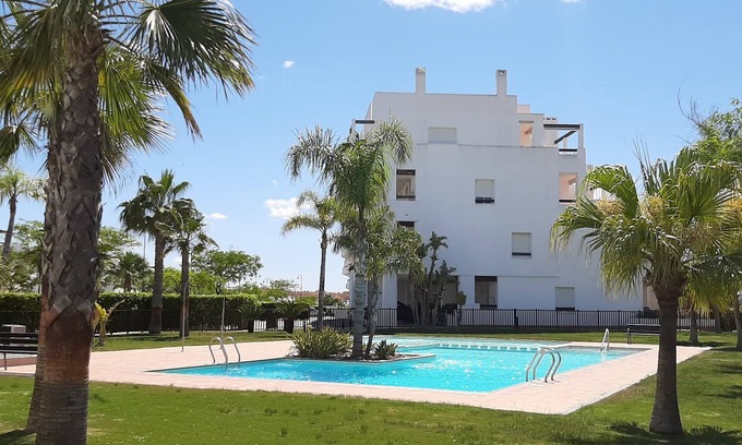 Alhama de Murcia Apartment | Scenic Casa Calida 3: Golf Course Views & Pool Access