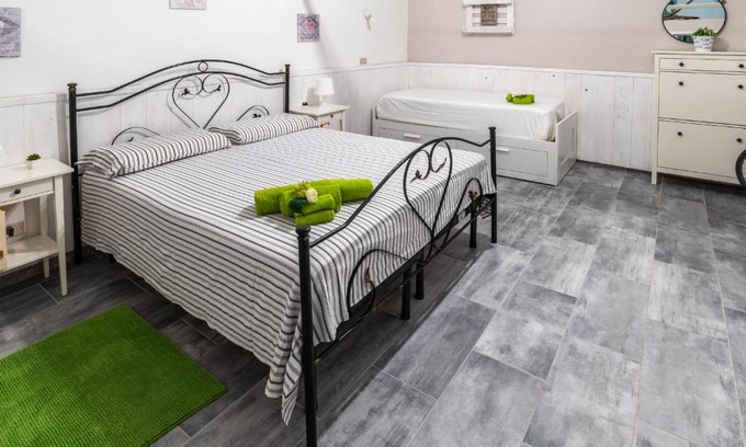 Bernalda Apartment | Kid-Friendly Retreat at Casa Caruso for Memorable Stays