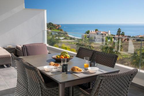 Porto de Mos Apartment | Oceanfront Casa Chloe: A 4-Star Getaway with Pool Access