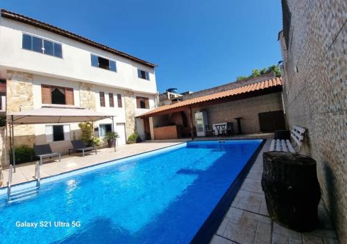 Pauliceia House | Relaxing Oasis with Pool and Ocean Views in SBC SP