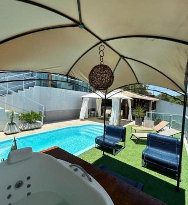 Nova Guarapari Apartment | Enchanting Casa com piscina Enseada Azul in Nova Guarapari
