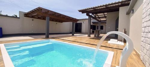 Capao da Canoa House | Pet-Friendly Oasis with Pool Near the Ocean in Capão Da Canoa
