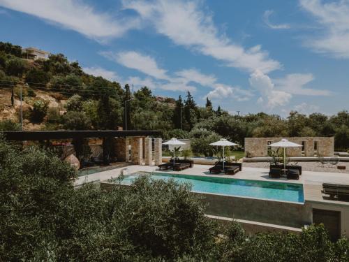Kanali Apartment | Idyllic Casa Costa Suites - Oceanfront Escape with Pool