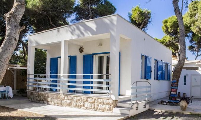 Porto Pino House | Casa Cristina: Pet-Friendly Retreat with Ocean Views