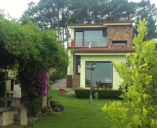 Aguino House | Discover Casa da Ameixida: Oceanfront Family Retreat