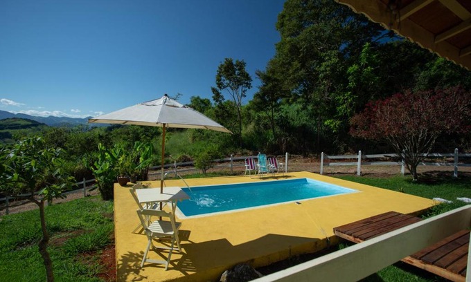 Paraisopolis Ski Chalet | Discover Casa de Campo Bosque das Pitaias: Pet Friendly Retreat