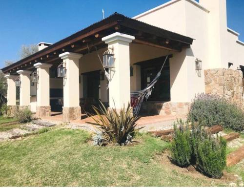 San Javier House | Relaxing CASA DE CAMPO COLIBRI with Pool & Kids' Play Area