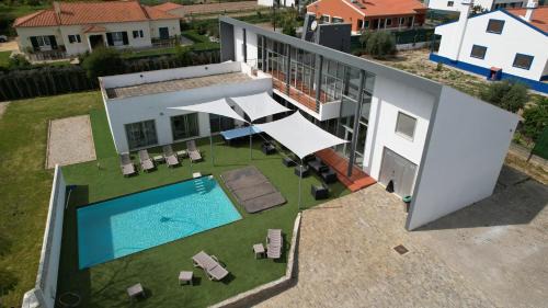 Gambia-Pontes-Alto da Guerra Cabin | Discover Casa de Cedros: Oceanfront Retreat with Pool