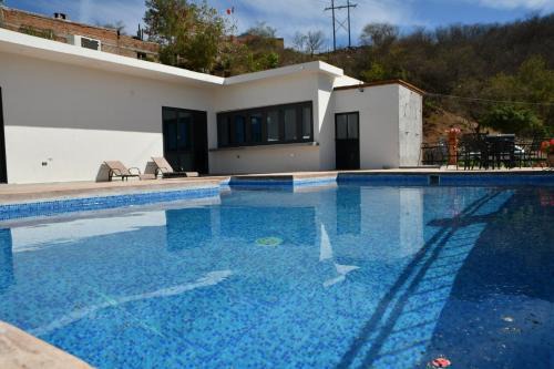 Alamos House | Experience Relaxation at Casa de Cuatro Vientos Hotel