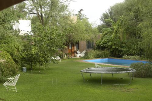 Cordoba Apartment | Exceptional Casa de Flores: Poolside Serenity Awaits