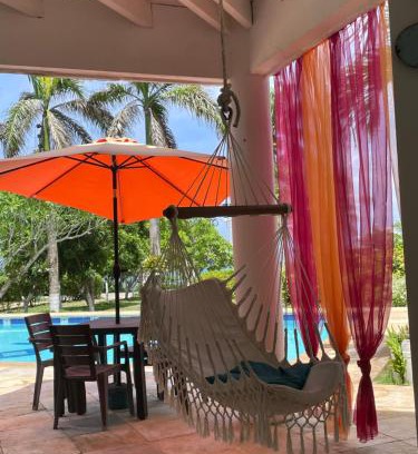 Punta Sur Hotel | Experience Casa de las Flores Tropical with Ocean Views