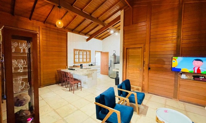 Palestina Ski Chalet | Exceptional Feitosa Wooden House with Oceanfront Views