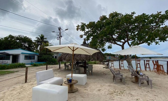 Tierra Bomba Island House | Beachfront Getaway with Caribbean Access and Pet-Friendly Perks