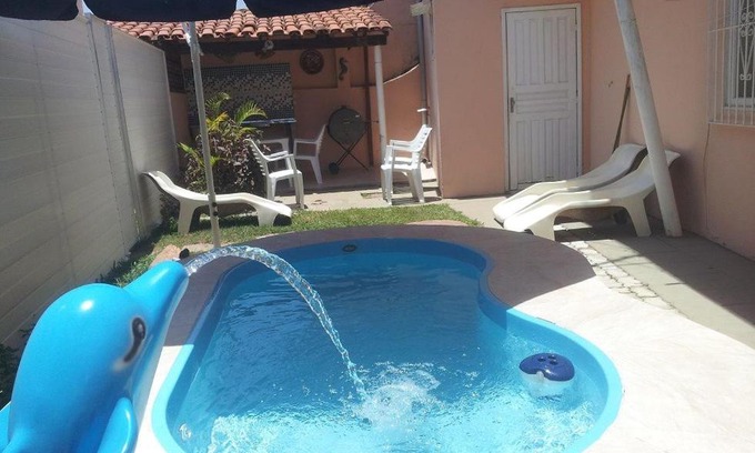Sao Pedro da Aldeia House | Beachfront Retreat: Casa de Praia with Ocean View & Pool