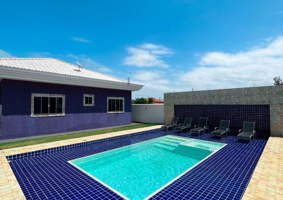 Sao Vicente de Paula House | Relax at Casa de Praia with Pool and Hot Tub Amenities