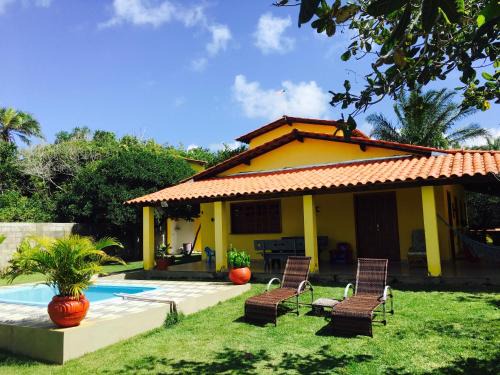 Aritagua Villa | Pet-Friendly Casa Amarela with Ocean Views for 14 Guests