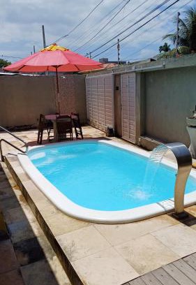 Nossa Senhora da Conceicao House | Beachfront Retreat in Maria Farinha - Family Friendly Stay
