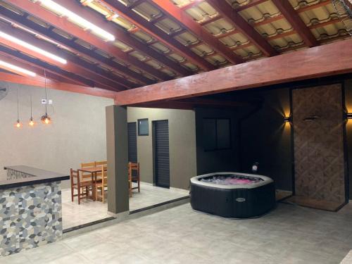 Olimpia House | Delightful Casa de Temporada Dona Santa with Hot Tub & Breakfast