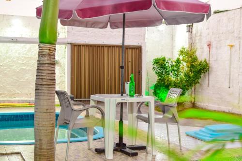 Aruanda House | Relaxing Oceanfront Retreat at Casa de Temporada Recanto Feliz