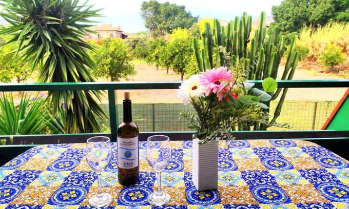 Chianchitta-Trappitello Apartment | Cozy Casa dei Fiori with Views in Taormina, Pet Friendly