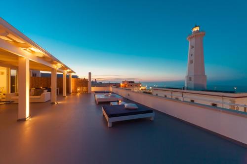 Torre Canne Apartment | Exquisite Oceanfront Retreat at Casa del Faro, 4-Star Gem