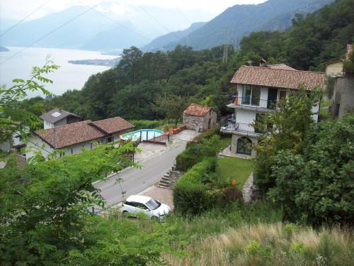 Sorico Apartment | Seaside Escape at Casa delle Camelie with Pool & Breakfast