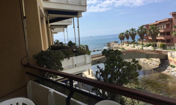 San Lorenzo al Mare Apartment | Casa Di Rosa: Oceanfront Retreat with Pool & Family Fun