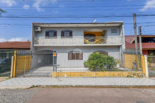Bacacheri House | Casa do Loro Hospedagem