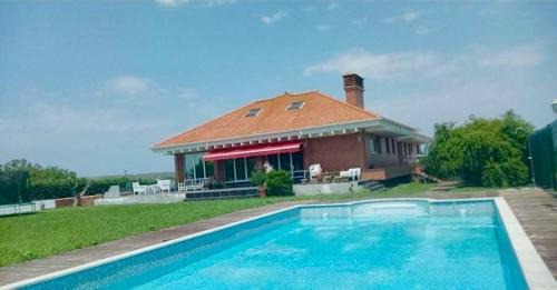 Sancibrian House | Discover Casa el Olivo in Santander: Pool & Hot Tub Retreat