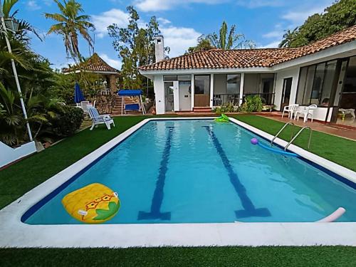 Girardot House | Discover Casa El Peñon: Pet-Friendly Hotel with Spa & Pool