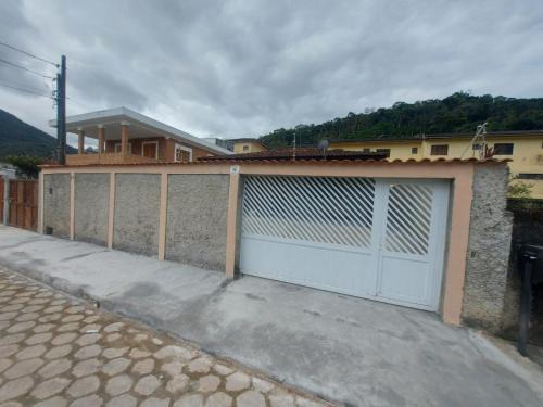 Ipiranga House | Experience Casa em Caraguatatuba: Perfect for Families & Pets